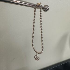 Tiffany & Co. Beaded Bracelet with Peace Charm